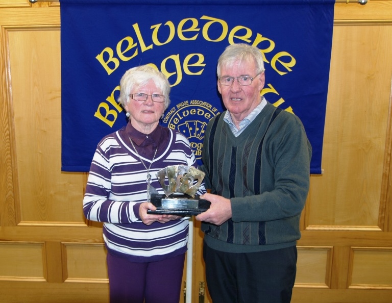 Winner Bridie Morris accepts the trophy from Belvedere President, Frank Maher. Missing from the photo is Anne Seery, Bridie's partner