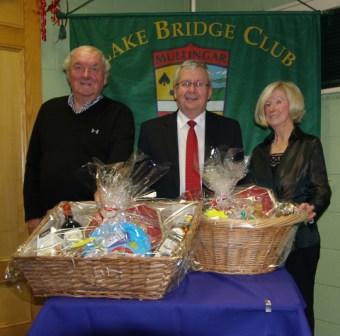 Lake Bridge Club Christmas Hamper - 3rd Nett winners Jim Quinlavin and Kay Moore with Gerry O'Gorman, Club President