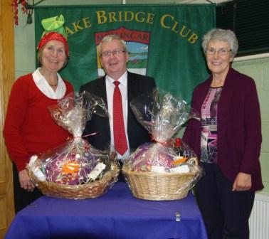 Lake Bridge Club Christmas Hamper - 7th Nett winners Susan Brown and Mary Savage with Gerry O'Gorman, Club President