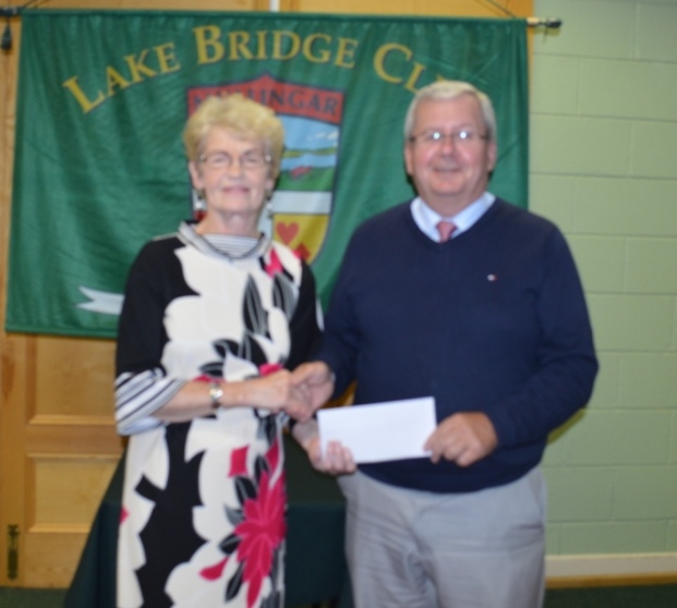 Helen Lynch the winner of the summer competition with club President Gerry O'Gorman