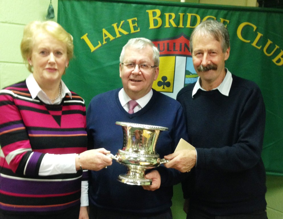 Winners of Analagh Trophy Carmel Maher and Sean Galligan with Gerry O Gorman, Lake Club president.